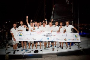 A happy crew on Tilmar Hansen's Elliott 52 Outsider after finishing the 3,000 mile competitive race in Grenada after 
13 days 13 hrs 47 mins 21secs © RORC/Arthur Daniel