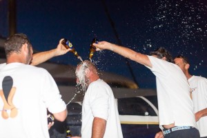 Cold beer shower for Laurent Pagès after Teasing Machine took overall win in the 4th RORC Transatlantic Race in Grenada © RORC/Arthur Daniel
