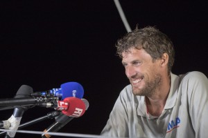 Paul Meilhat talks to media on the pontoon in Guadeloupe after winning the IMOCA class.