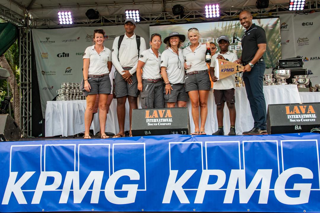 Antiguan youths Maurice Belgrave and Anthony Hall on the podium at KPMG Race Day as part of Team Sojana