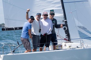 Travis Odenbach and crew on 'Honey Badger' win J/70 Class