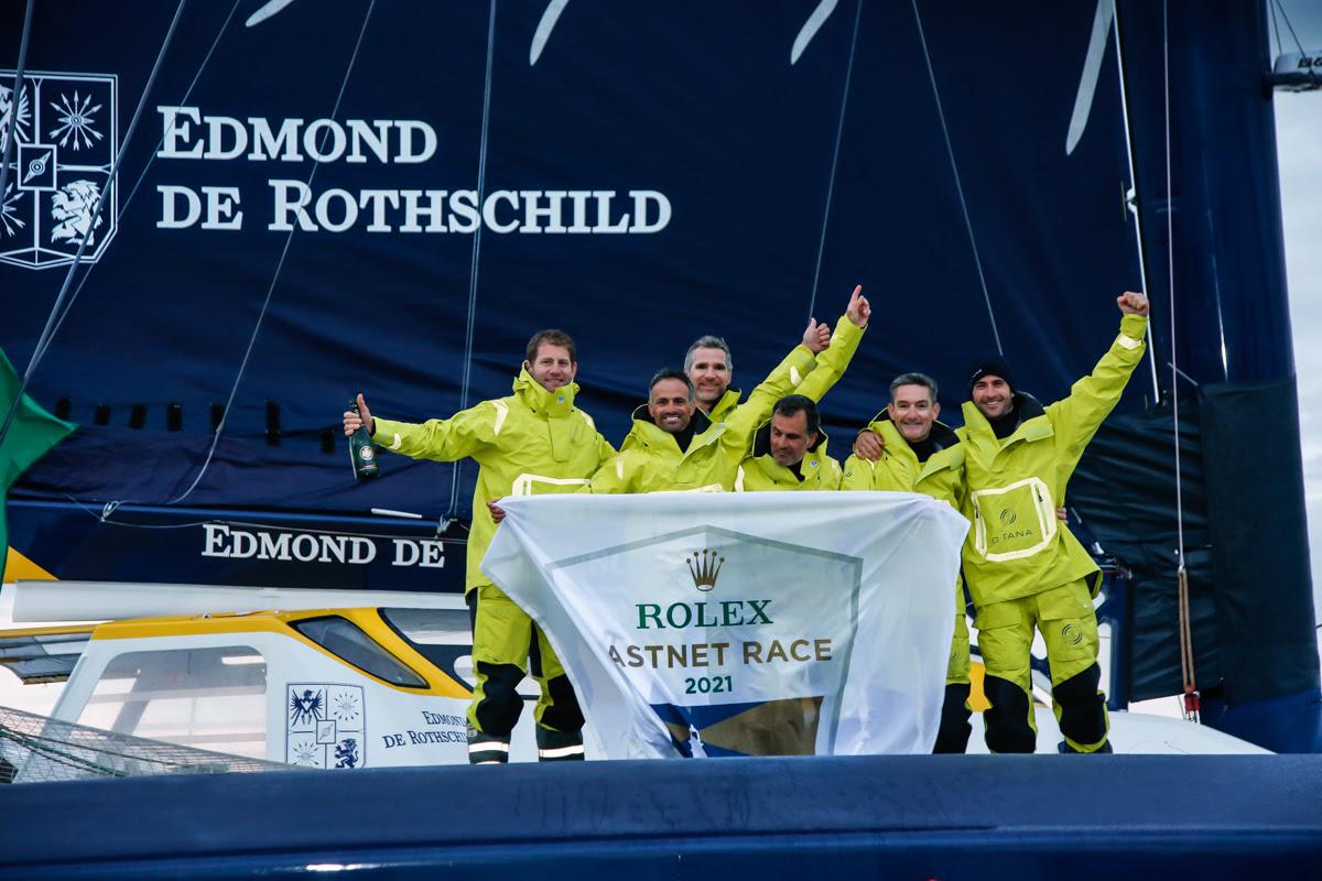 The Maxi Edmond de Rothschild crew celebrate their latest victory. © Paul Wyeth
