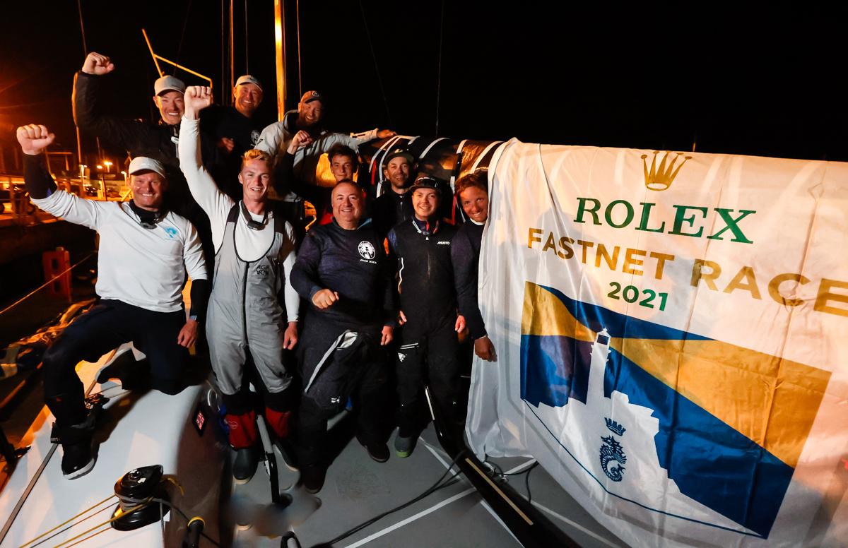 Dockside celebrations as RORC Commodore James Neville and crew on his HH42 Ino XXX finish the Rolex Fastnet Race in Cherbourg
and lead IRC One © Paul Wyeth/pwpictures.com