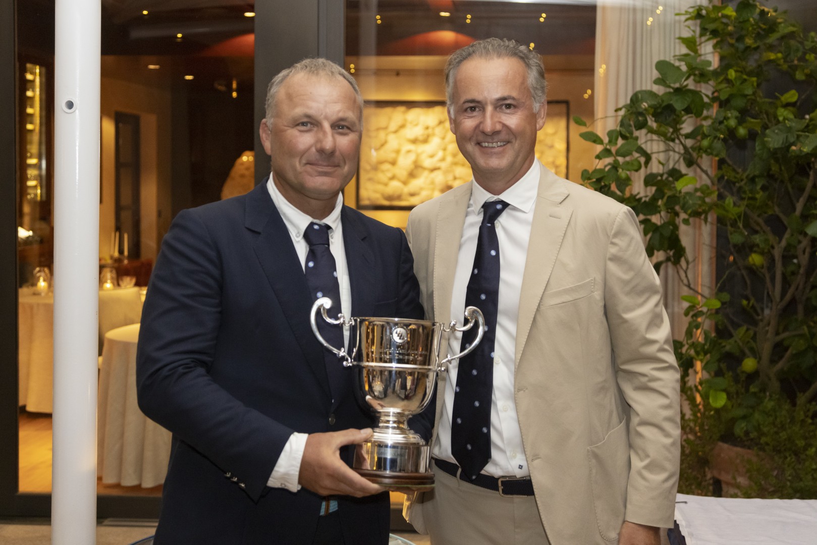 I Love Poland's skipper Grzegorz Baranowski is presented with the IMA Caribbean Maxi Challenge prize by IMA President Benoît de Froidmont.
