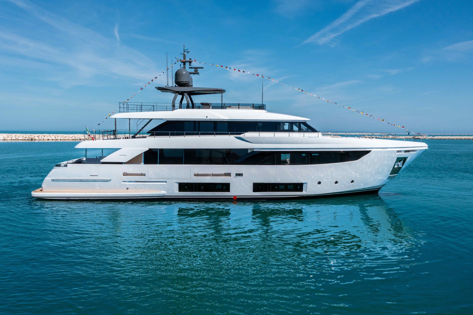Custom Line celebrates the launch of its 27th Navetta 33 superyacht
