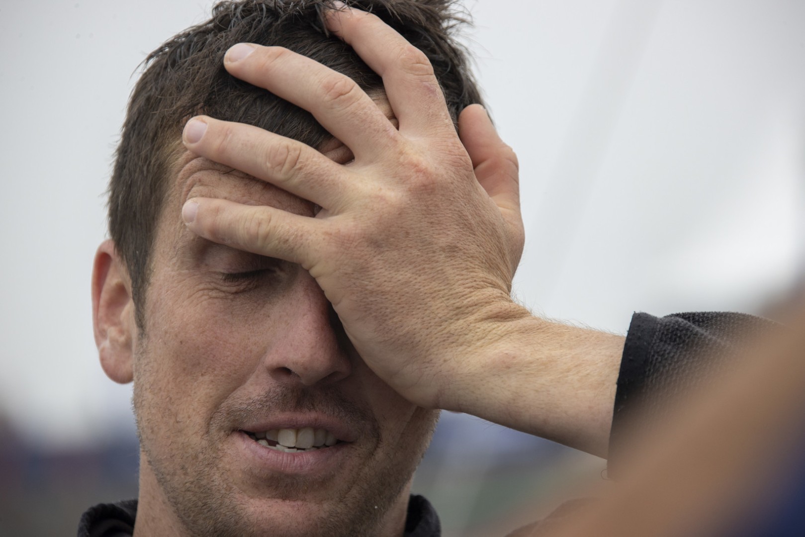 Disappointment and extreme fatigue etched on the face of Irish skipper Tom Dolan 

Photo ©Alexis Courcoux