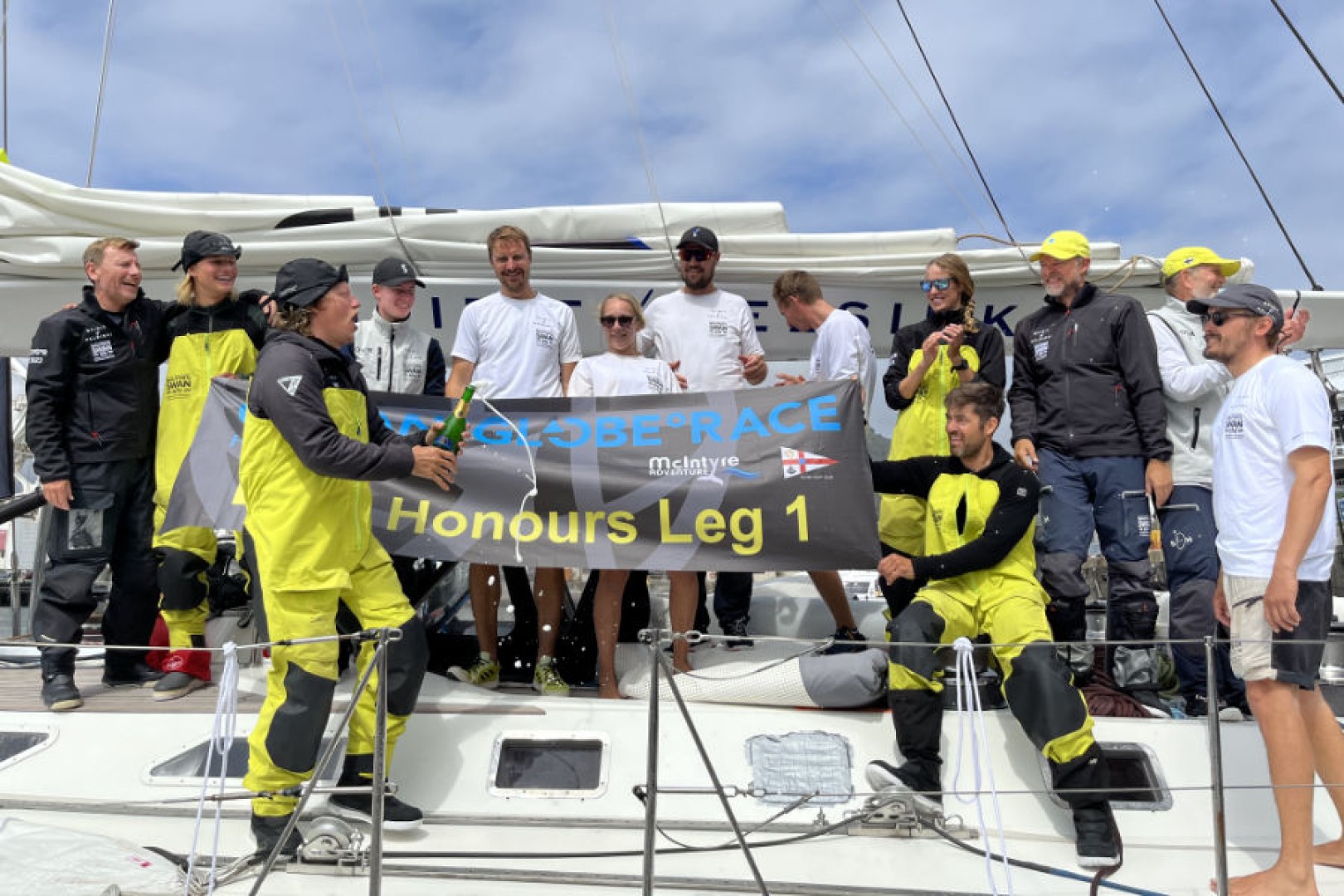 Champagne time for Spirit of Helsinki to celebrate line honours victory in Cape Town. Credit: Jacqueline Kavanagh / OGR 2023.