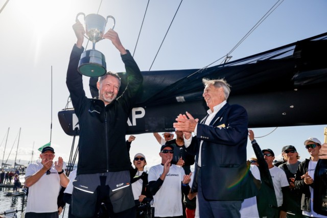 Christian Beck celebrates with the J.H. Illingworth Challenge Cup on LawConnect © Salty Dingo