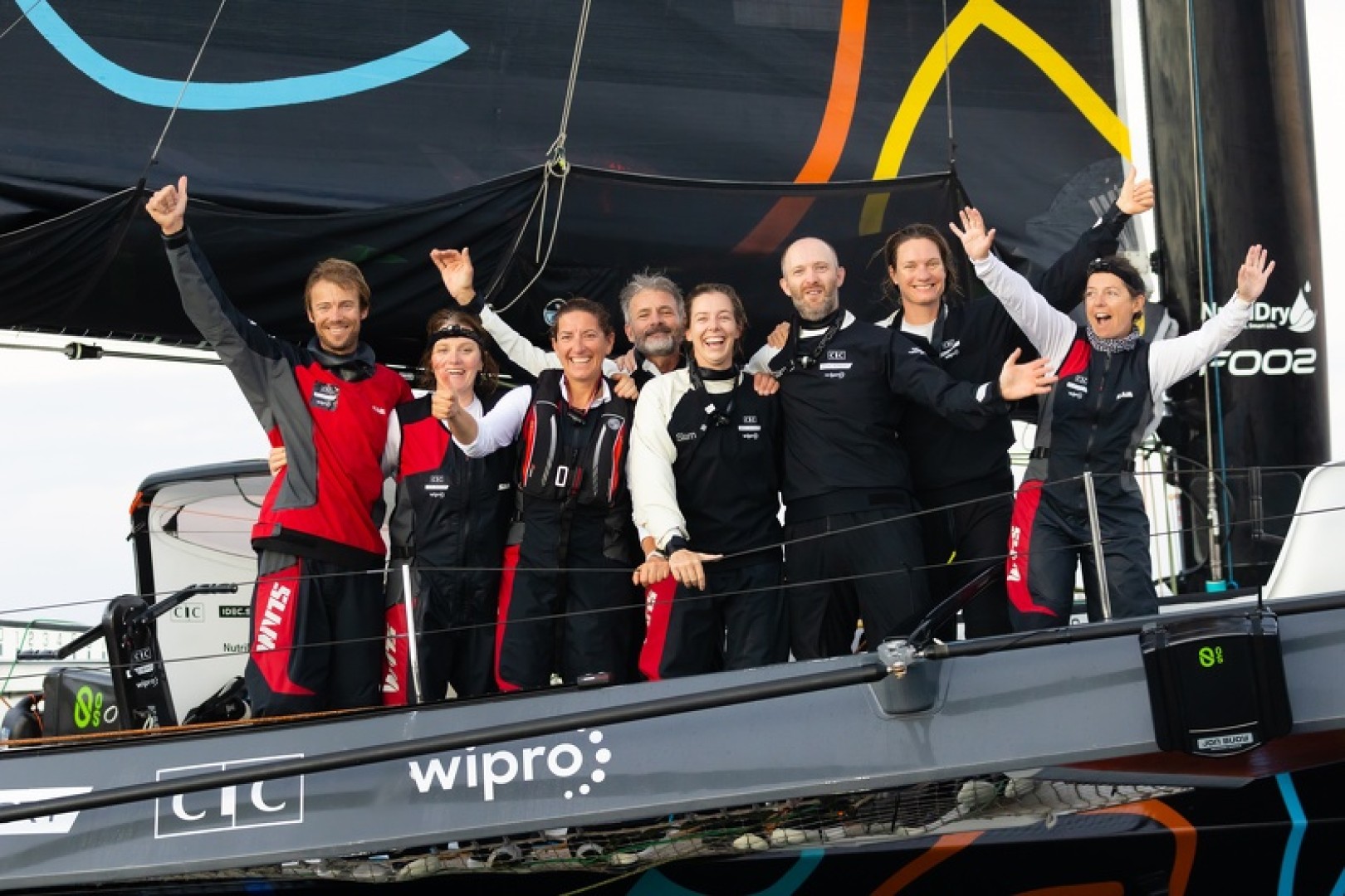 Smiles all round on board MOD70 Limosa/The Famous Project after completing the RORC Transatlantic Race © Arthur Daniel/RORC