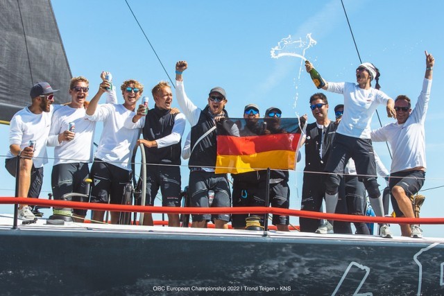 Another day of champagne sailing...literally! Gold medal winners HALBTROCKEN 4.5 celebrate victory in Class A