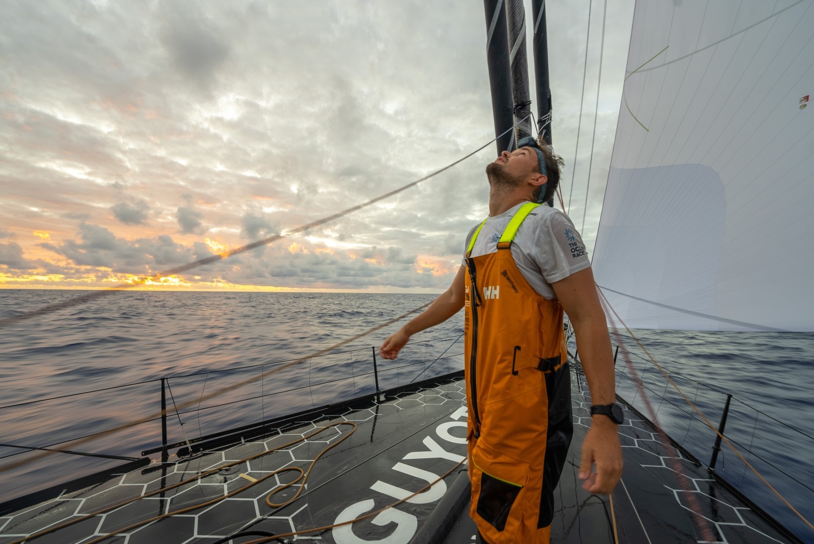 Leg 2, Day 10 onboard Guyot environnement - Team Europe. Phillip Kasüske on the bow at sunrise.
© Charles Drapeau