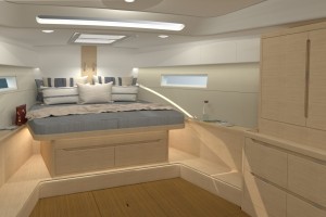 The default saloon layout has L-shaped dinette seating and an island galley. The owner’s cabin has a king size bed facing aft